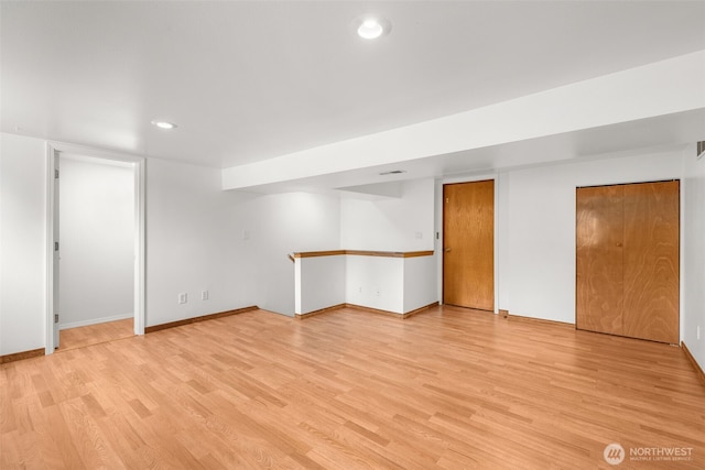 28713 207th Ave SE, Kent, WA 98042 - finished below grade area with light wood-type flooring and recessed lighting
