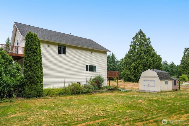 28713 207th Ave SE, Kent, WA 98042 - view of property exterior featuring a shed, a lawn, and a deck