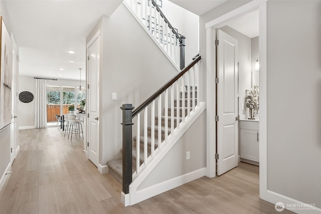 20230 150th St E Unit 598, Bonney Lake, WA 98391 - stairway with wood finished floors and recessed lighting