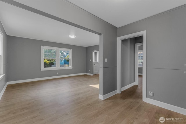 2849 Flordia St, Longview, WA 98632 - spare room with light wood-style floors and arched walkways