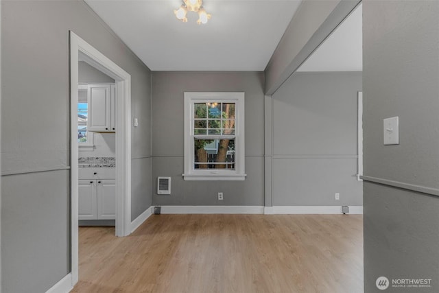 2849 Flordia St, Longview, WA 98632 - unfurnished dining area featuring light wood-style flooring and a chandelier