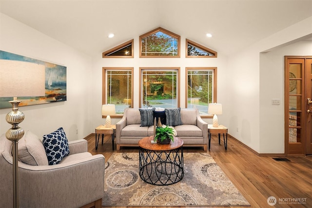 44422 SE 130th St, North Bend, WA 98045 - living room featuring lofted ceiling, wood finished floors, and recessed lighting
