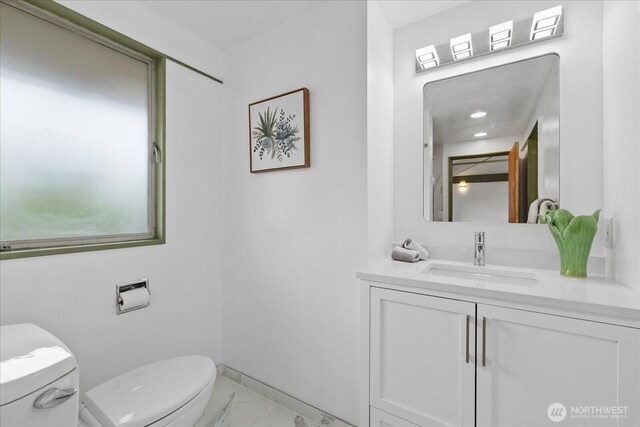 5717 S Ryan St, Seattle, WA 98178 - bathroom featuring marble look tiles and vanity