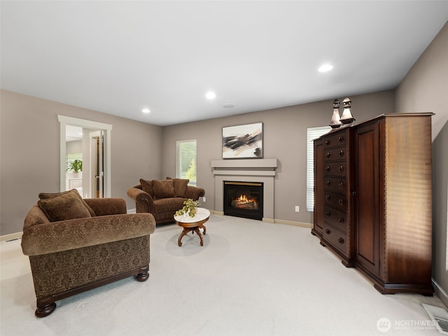 16825 SE 376th St, Auburn, WA 98092 - living area with a lit fireplace, light carpet, and recessed lighting