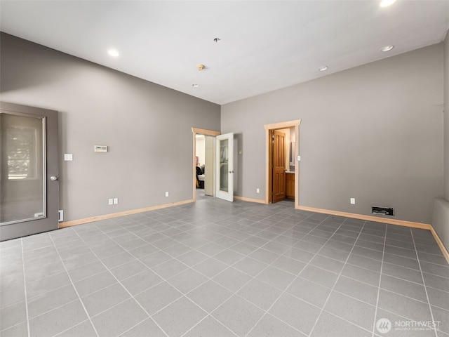 16825 SE 376th St, Auburn, WA 98092 - tiled empty room with recessed lighting and baseboards