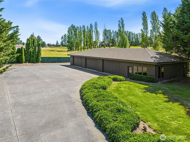 16825 SE 376th St, Auburn, WA 98092 - view of property exterior with a yard and a detached garage