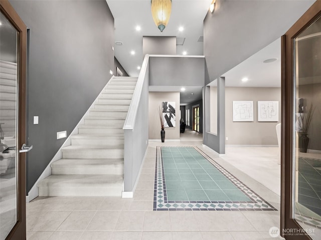 16825 SE 376th St, Auburn, WA 98092 - stairs featuring tile patterned flooring and recessed lighting