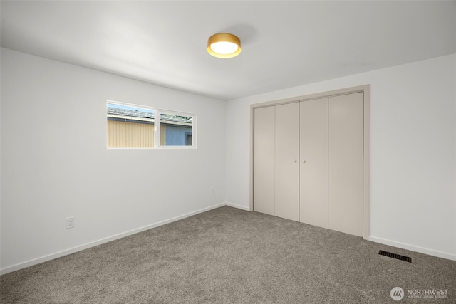 24222 54th Ave W Unit 55, Mountlake Terrace, WA 98043 - unfurnished bedroom featuring carpet floors and a closet