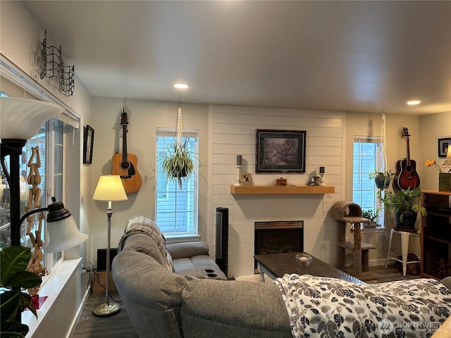 314 Birchwood Ln, Sedro Woolley, WA 98284 - living area featuring a tiled fireplace, wood finished floors, and recessed lighting