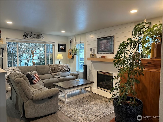314 Birchwood Ln, Sedro Woolley, WA 98284 - living area with wood finished floors, a tile fireplace, and recessed lighting