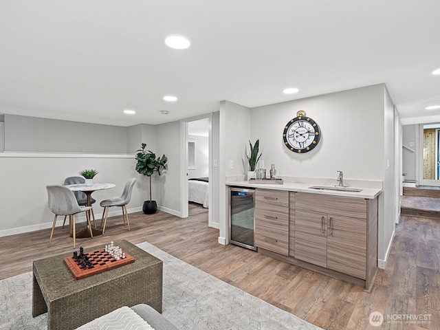 4853 42nd Ave SW, Seattle, WA 98116 - bar area with beverage cooler, light wood finished floors, and recessed lighting