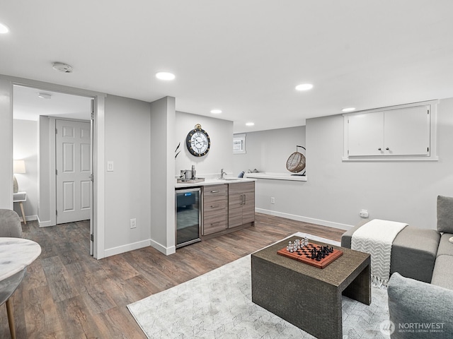 4853 42nd Ave SW, Seattle, WA 98116 - living room with wine cooler, wet bar, dark wood finished floors, and recessed lighting