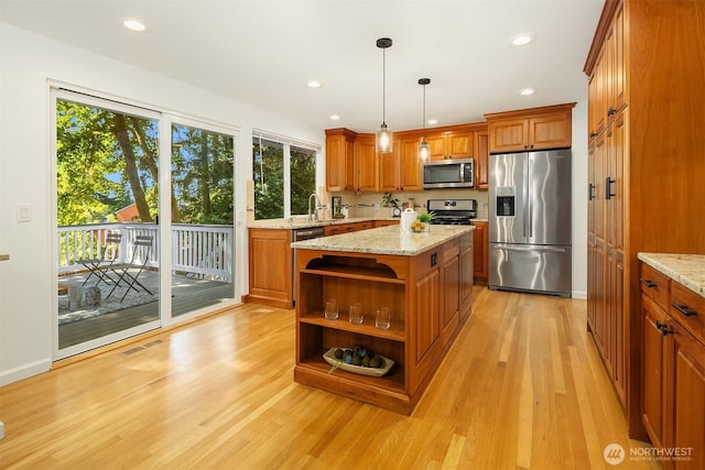 10733 126th Pl NE, Kirkland, WA 98033 - kitchen with stainless steel appliances, brown cabinets, open shelves, light wood-type flooring, and recessed lighting