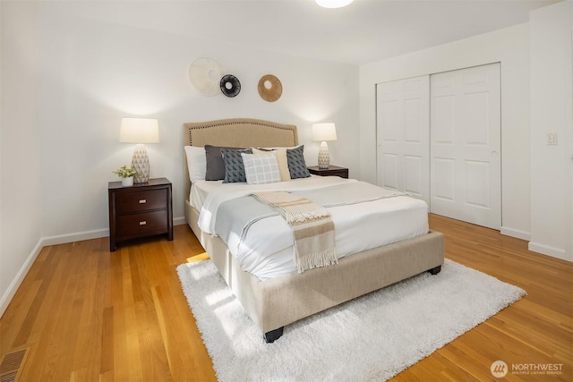 10733 126th Pl NE, Kirkland, WA 98033 - bedroom with a closet and wood finished floors