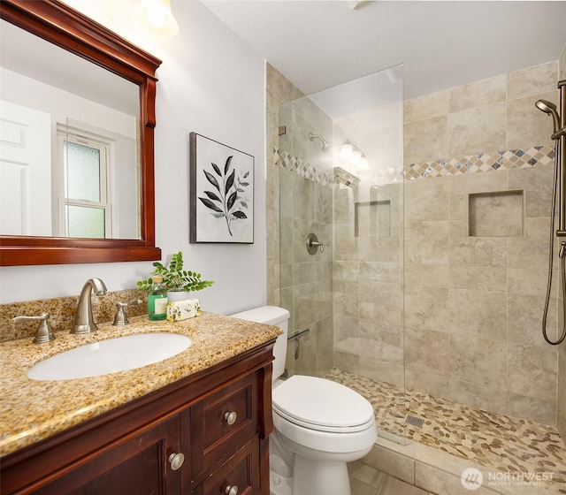 10733 126th Pl NE, Kirkland, WA 98033 - bathroom featuring vanity and a tile shower