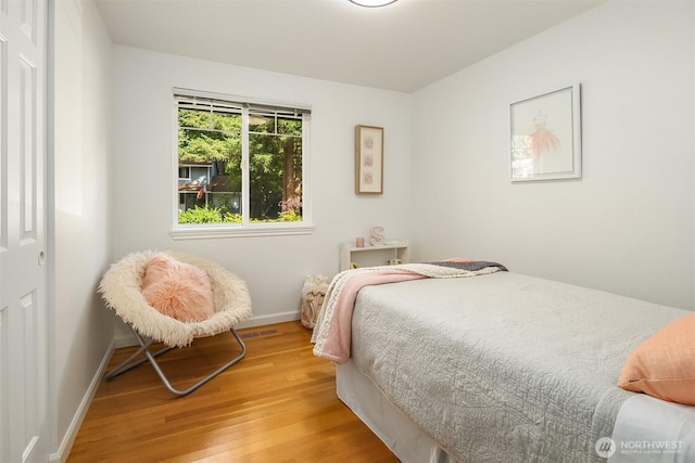 10733 126th Pl NE, Kirkland, WA 98033 - bedroom with light wood finished floors and baseboards