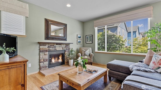 4422 NE 2nd Ln, Renton, WA 98059 - living room featuring a fireplace, light wood-style floors, and recessed lighting