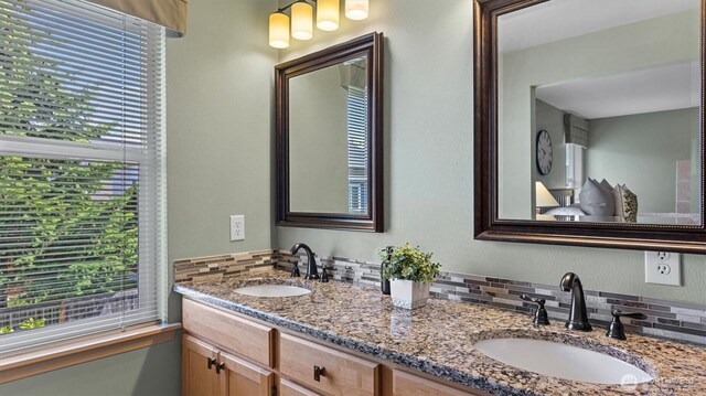 4422 NE 2nd Ln, Renton, WA 98059 - full bath with decorative backsplash and double vanity