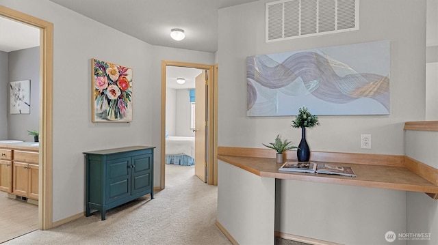 4422 NE 2nd Ln, Renton, WA 98059 - hallway featuring light colored carpet and baseboards