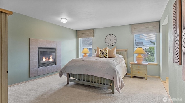 4422 NE 2nd Ln, Renton, WA 98059 - carpeted bedroom with a fireplace and baseboards