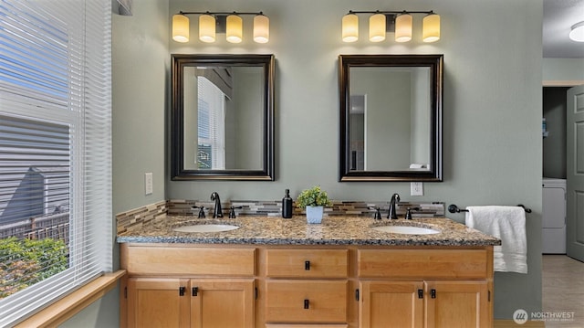 4422 NE 2nd Ln, Renton, WA 98059 - full bath with double vanity and washer / dryer