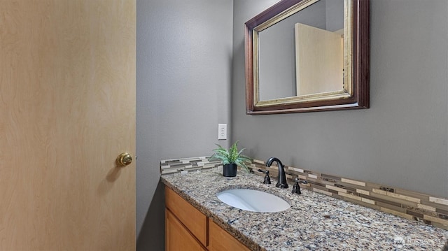 4422 NE 2nd Ln, Renton, WA 98059 - bathroom featuring vanity and decorative backsplash