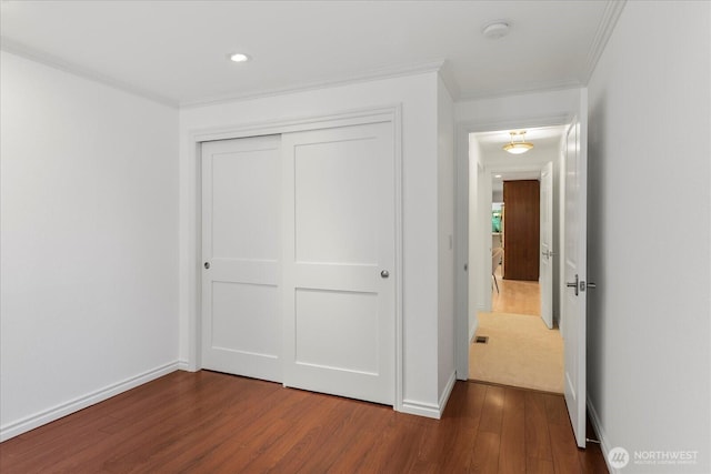 8606 184th St SW, Edmonds, WA 98026 - unfurnished bedroom with wood finished floors, crown molding, a closet, and recessed lighting