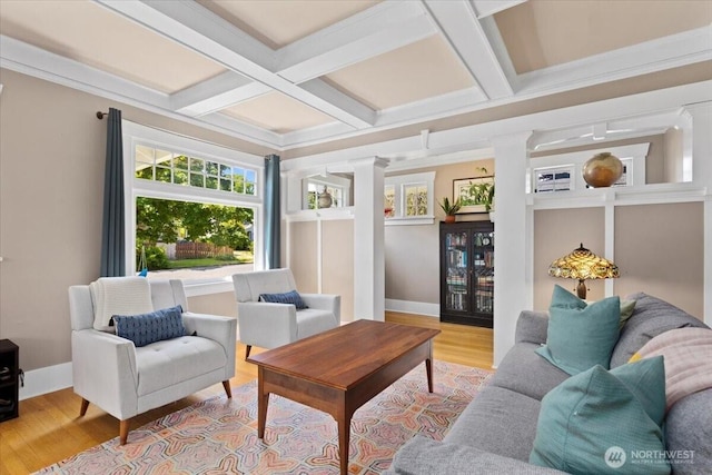 751 S 40th St, Tacoma, WA 98418 - living area featuring light wood finished floors, coffered ceiling, decorative columns, and beam ceiling