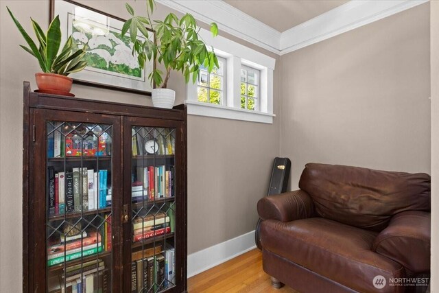 751 S 40th St, Tacoma, WA 98418 - living area featuring wood finished floors and crown molding