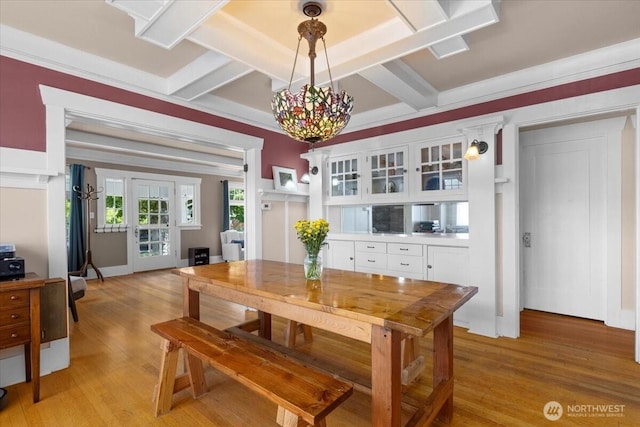 751 S 40th St, Tacoma, WA 98418 - dining area featuring light wood-style flooring, coffered ceiling, and beam ceiling
