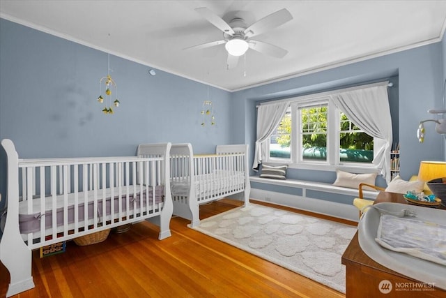 751 S 40th St, Tacoma, WA 98418 - bedroom featuring wood finished floors, ornamental molding, and ceiling fan