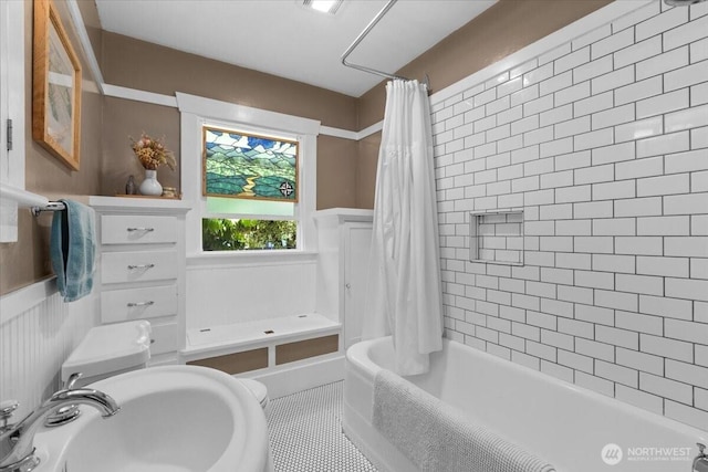 751 S 40th St, Tacoma, WA 98418 - bathroom with shower / bath combo, wainscoting, and tile patterned flooring