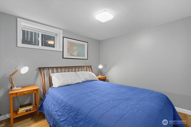 751 S 40th St, Tacoma, WA 98418 - bedroom featuring wood finished floors and baseboards