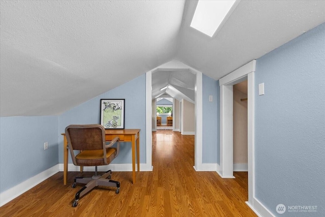 751 S 40th St, Tacoma, WA 98418 - office area featuring wood finished floors, a textured ceiling, and lofted ceiling