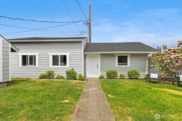 751 S 40th St, Tacoma, WA 98418 - view of front of house with a front yard and a shingled roof