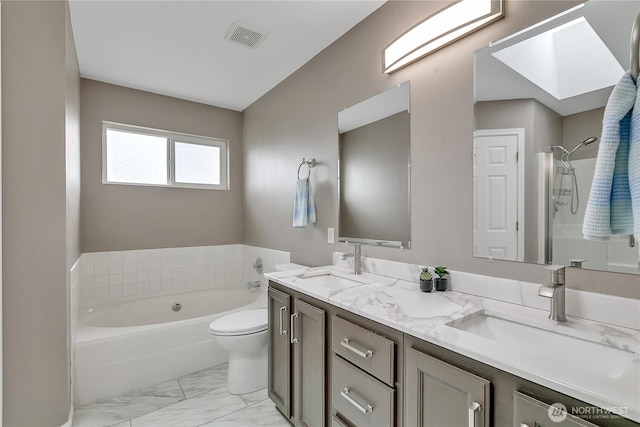 10125 232nd Ave E, Buckley, WA 98321 - full bath with a garden tub, a skylight, double vanity, and marble finish floors