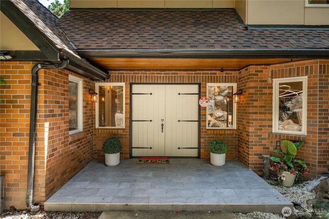 13710 41st Ave NE, Seattle, WA 98125 - doorway to property with brick siding and a shingled roof