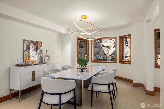 13710 41st Ave NE, Seattle, WA 98125 - dining area featuring light wood-style floors and a chandelier