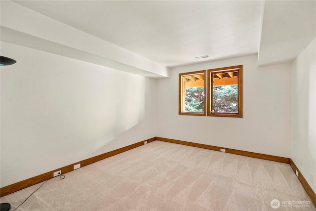 13710 41st Ave NE, Seattle, WA 98125 - carpeted spare room featuring baseboards