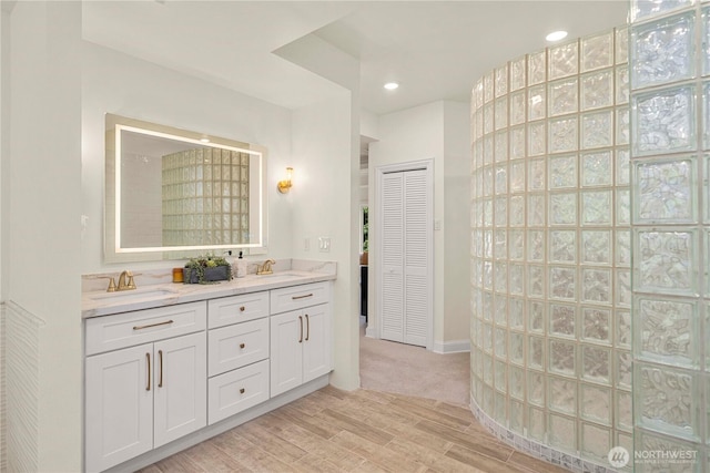 13710 41st Ave NE, Seattle, WA 98125 - full bathroom featuring double vanity, wood finished floors, and recessed lighting