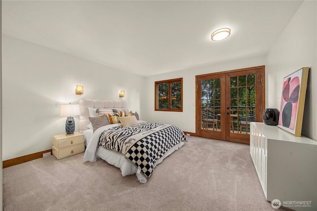 13710 41st Ave NE, Seattle, WA 98125 - bedroom featuring french doors, light carpet, and access to outside