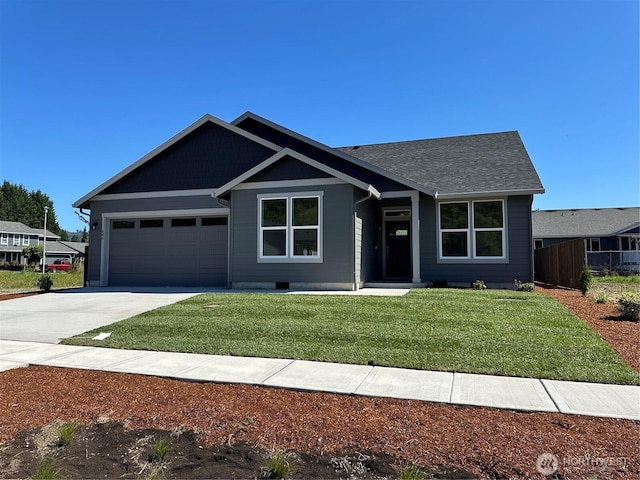 566 Rainbow Way, Kelso, WA 98626 - ranch-style home featuring concrete driveway and an attached garage