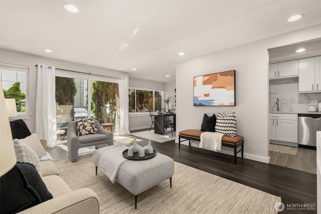 2219 Eastlake Ave E Unit 101, Seattle, WA 98102 - living room with recessed lighting and dark wood-style flooring