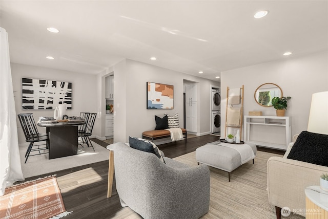 2219 Eastlake Ave E Unit 101, Seattle, WA 98102 - living room with stacked washer / dryer, recessed lighting, and wood finished floors