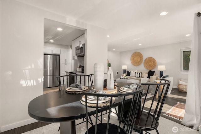 2219 Eastlake Ave E Unit 101, Seattle, WA 98102 - dining area with light wood-style floors and recessed lighting