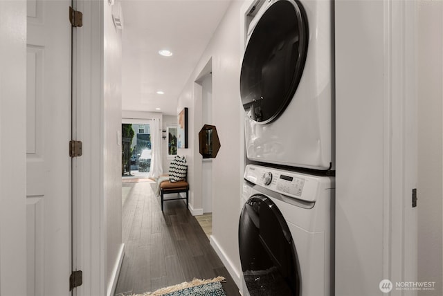2219 Eastlake Ave E Unit 101, Seattle, WA 98102 - washroom with stacked washer and clothes dryer, wood finished floors, and recessed lighting