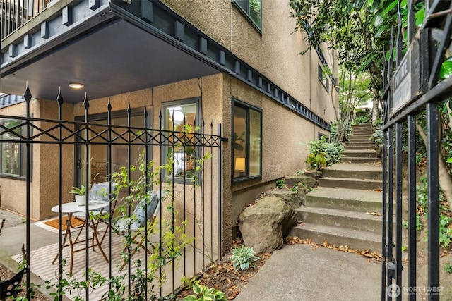 2219 Eastlake Ave E Unit 101, Seattle, WA 98102 - view of exterior entry with stucco siding
