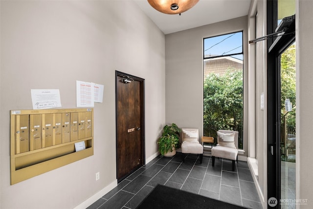 2219 Eastlake Ave E Unit 101, Seattle, WA 98102 - entryway with mail area and baseboards