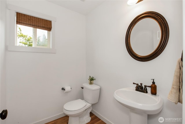 1344 Foreman Rd, Dupont, WA 98327 - bathroom featuring toilet and wood finished floors