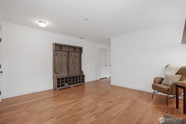 1344 Foreman Rd, Dupont, WA 98327 - living area featuring light wood-type flooring and baseboards